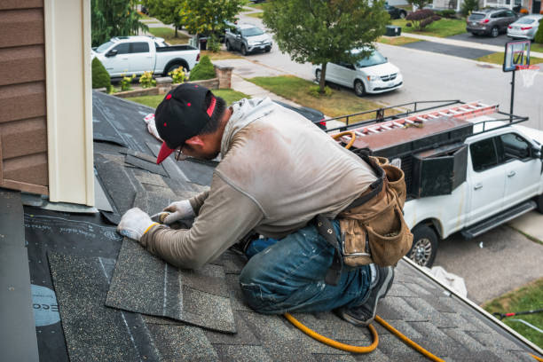 Professional Roof Repair technician working in Bogota, NJ